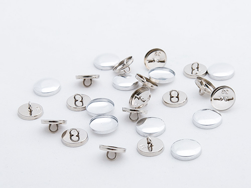 東莞鈕扣廠介紹為什么以前的紐扣在左邊