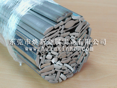 如何降低金属异型材料生产过程中废料率？