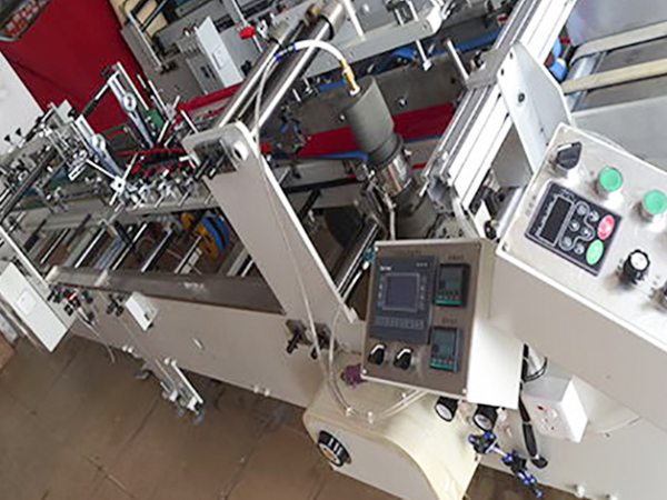 塑料胶盒折边机