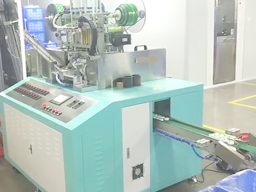 一岀十的38盖贴膜机